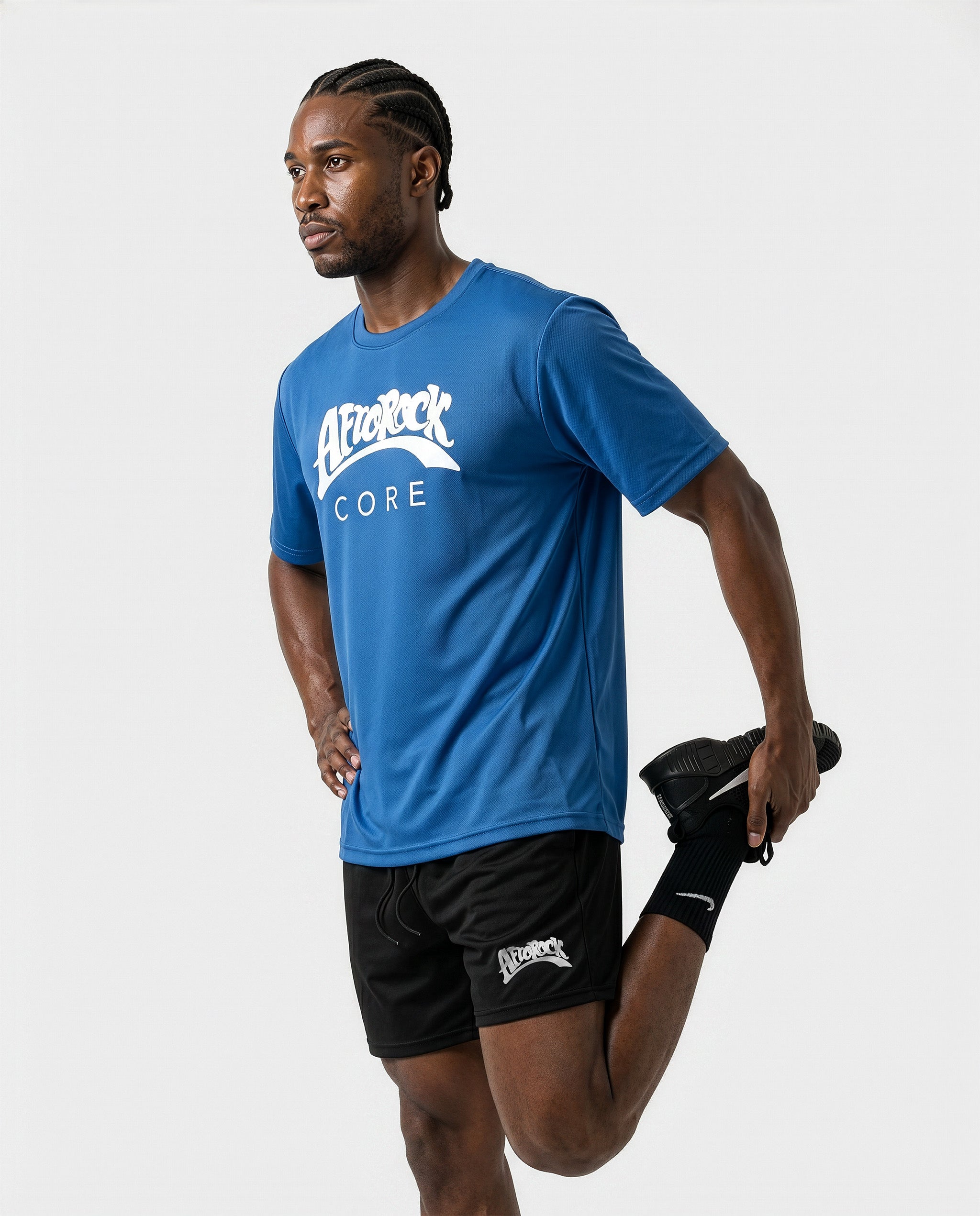 Side view workout of Model Michael wearing the AfroRock Core Performance T-Shirt and Black Activewear Shorts. Premium streetwear-inspire Blue activewear designed for performance and style.⁠