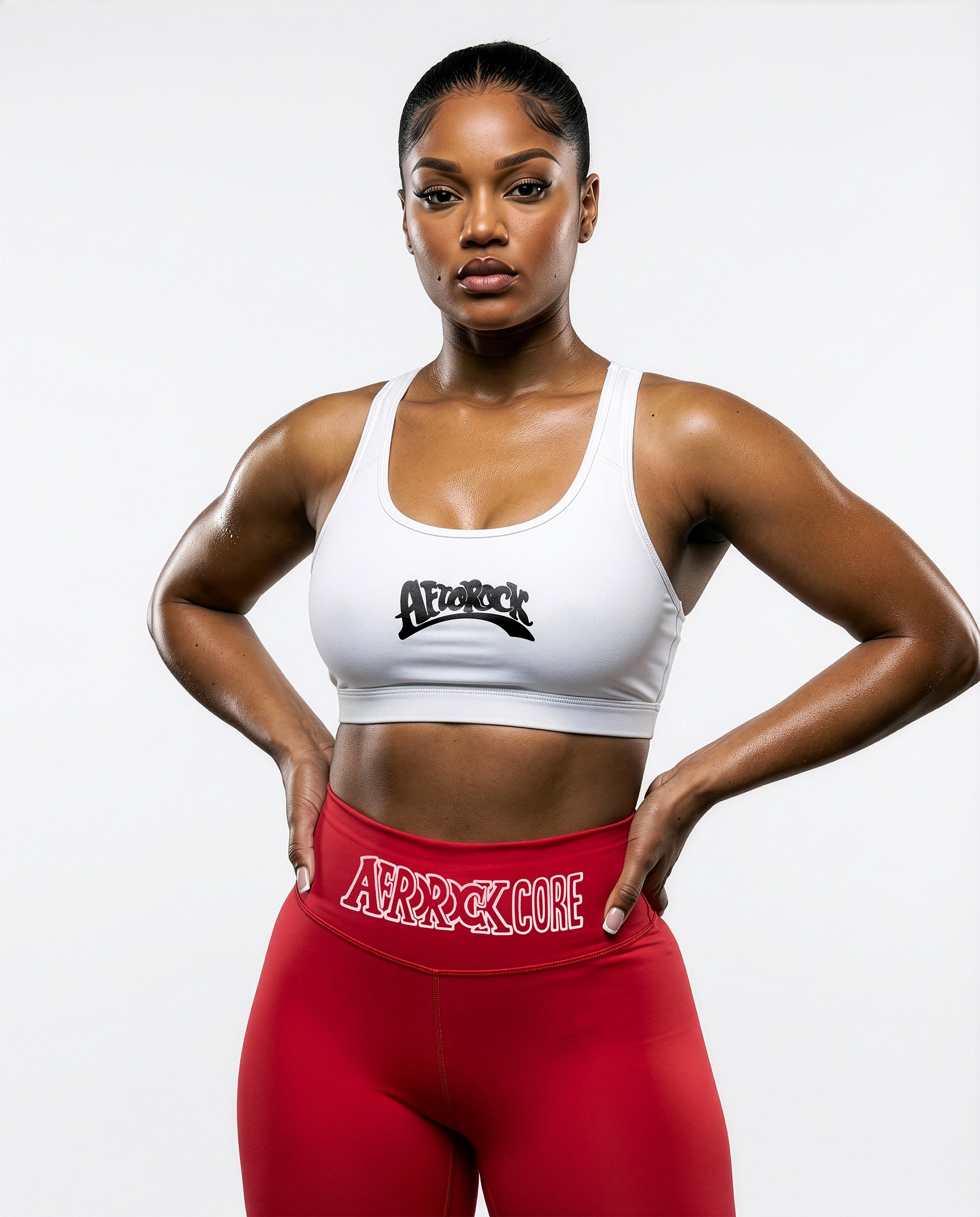 Model Nina wearing the AfroRock Core high-waisted red yoga leggings and white sports bra. Premium streetwear-inspired activewear designed for performance and style.⁠