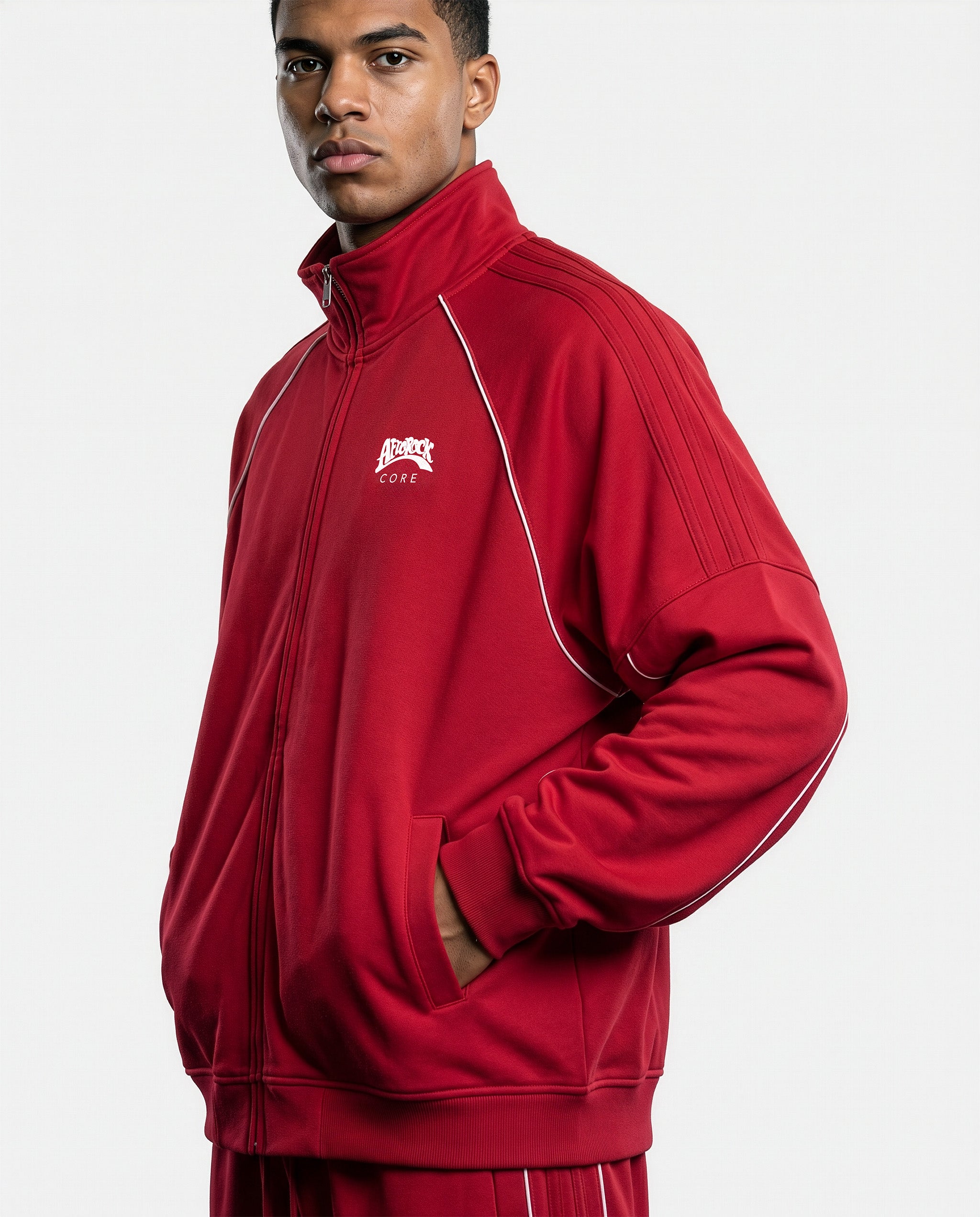 Three-Quarter Side view of the AfroRock Core Reflective Striped Jacket Red on model Zach, showcasing the premium streetwear fit and branding details.⁠ 